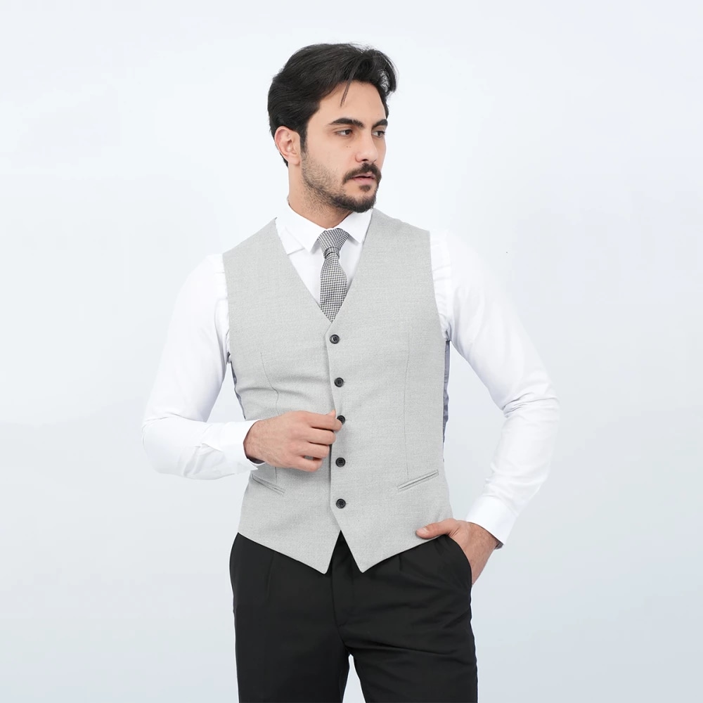 Costume 3 pièces texturé avec veste contrastée, porté de face noir